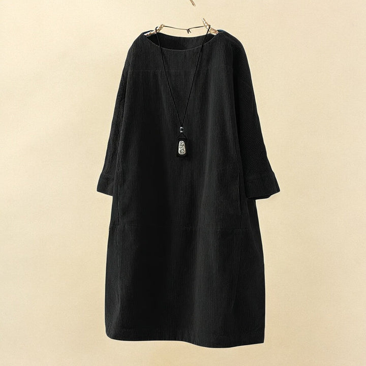 Chic women's draped dress, elegant and flattering, offering tummy control for comfort.