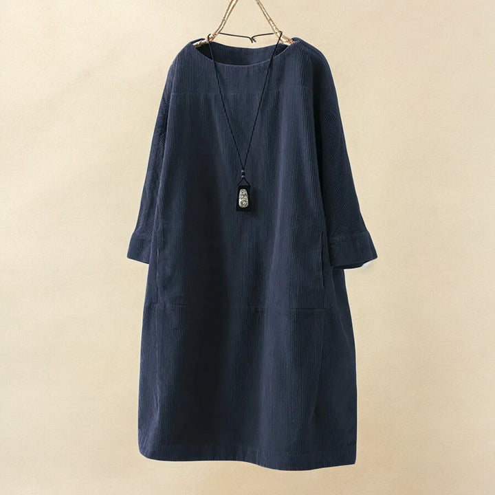 Tummy flattering women's draped dress, elegant comfort for a smooth silhouette.