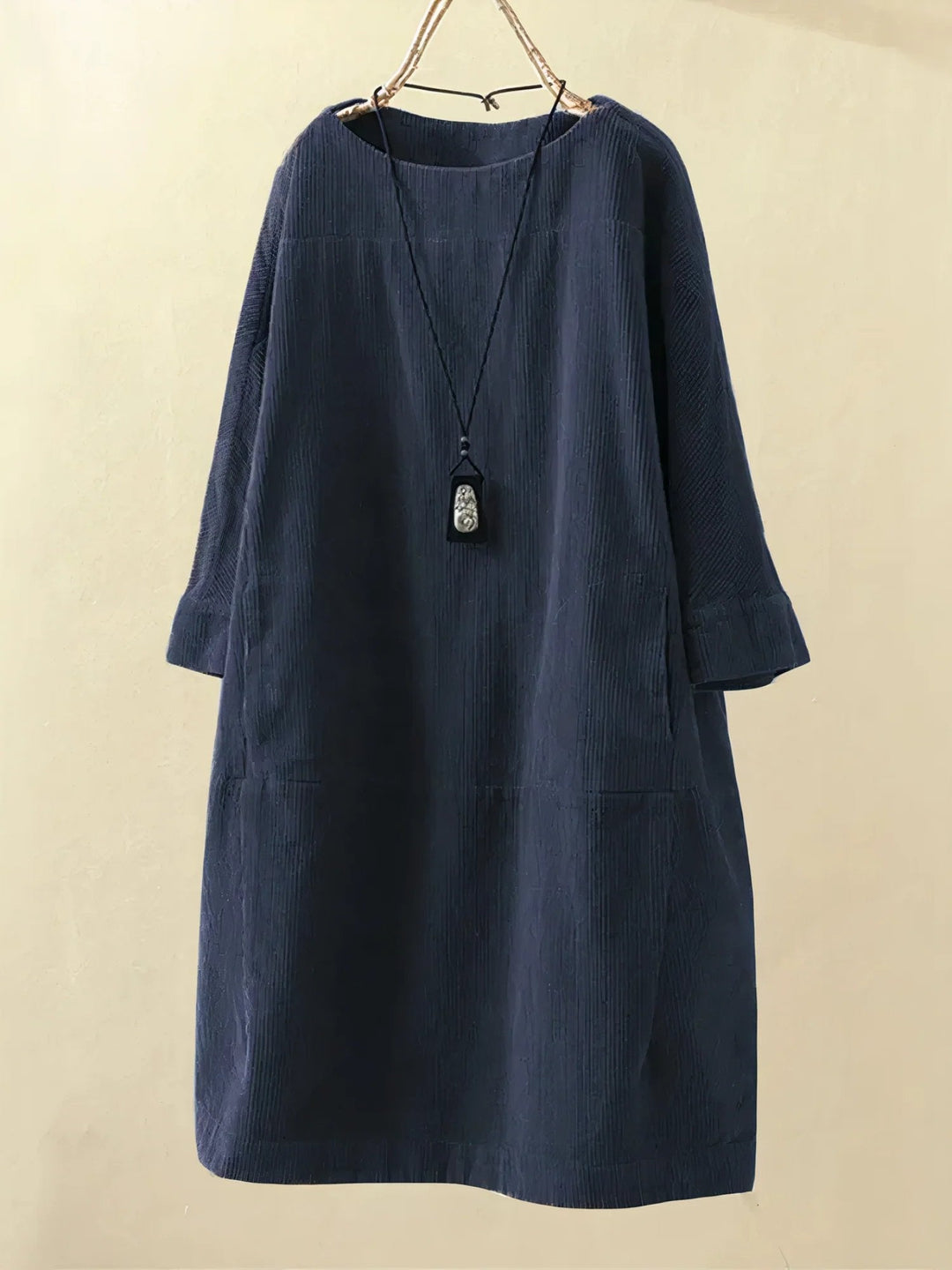 Stylish women's draped dress, flattering fit, elegant fashion for all occasions.