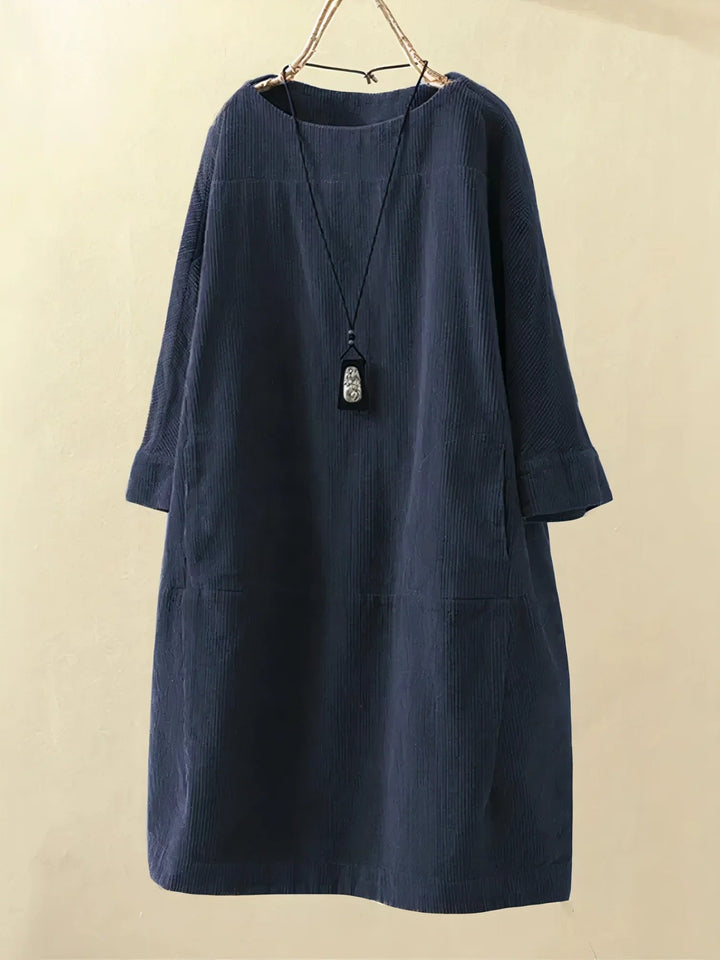 Stylish women's draped dress, flattering fit, elegant fashion for all occasions.