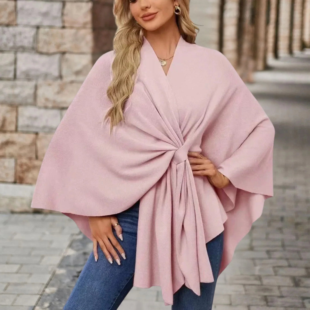 Elegant women's draped poncho in a flowing fabric, perfect for stylish comfort & versatile outerwear.