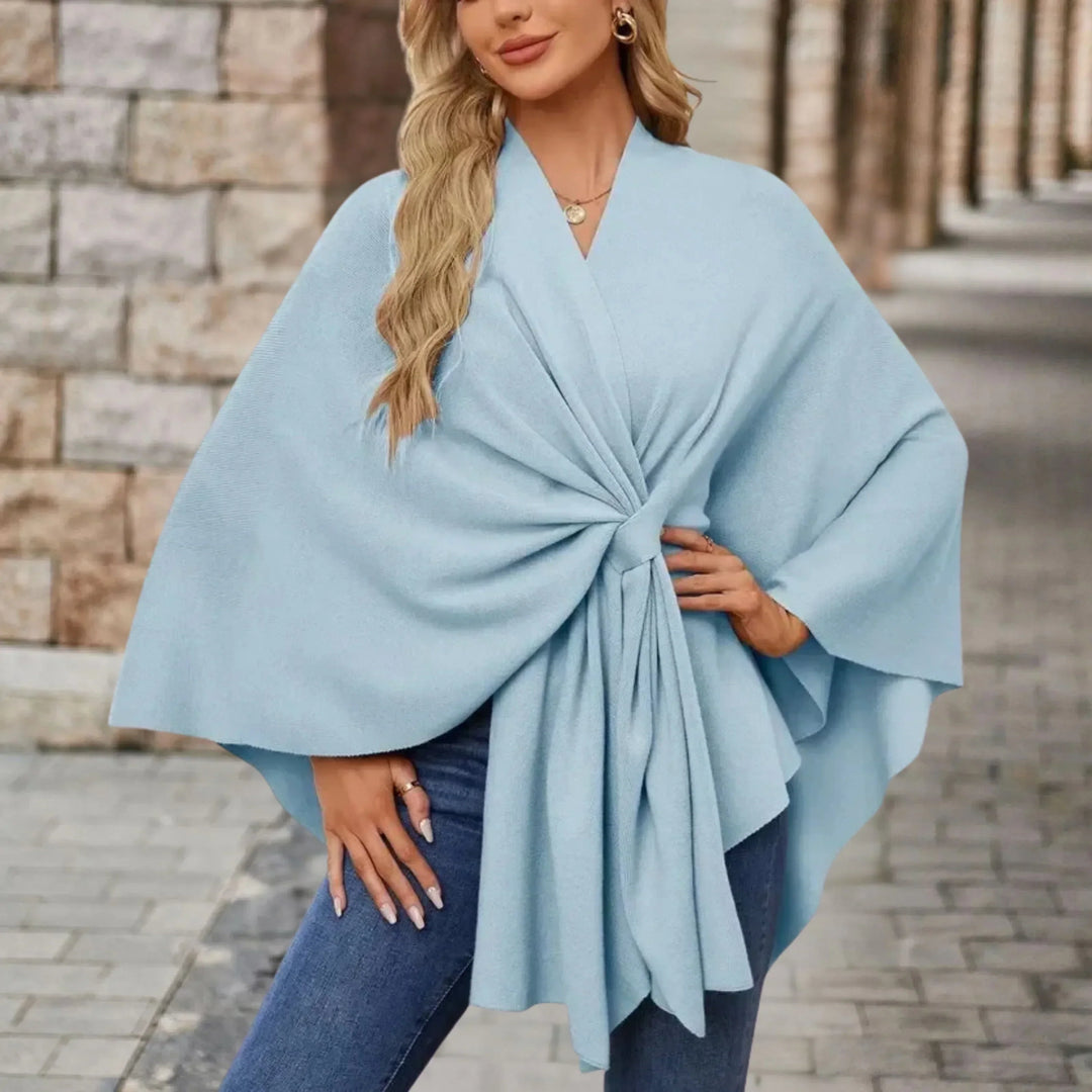 Stylish women's fashion wrap, a comfortable one-size draped poncho for versatile layering & outerwear.