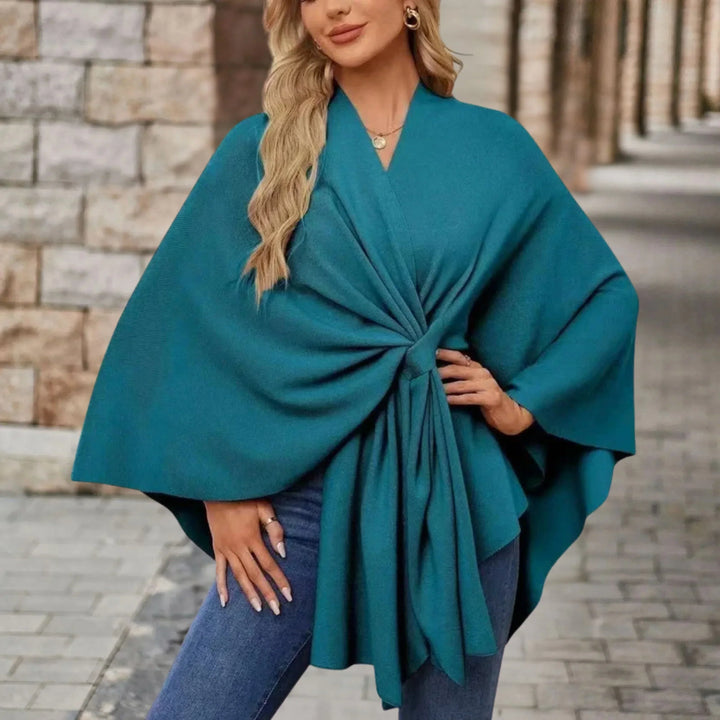 Flowing draped poncho for women, offering an elegant and comfortable fashion wrap as stylish outerwear.