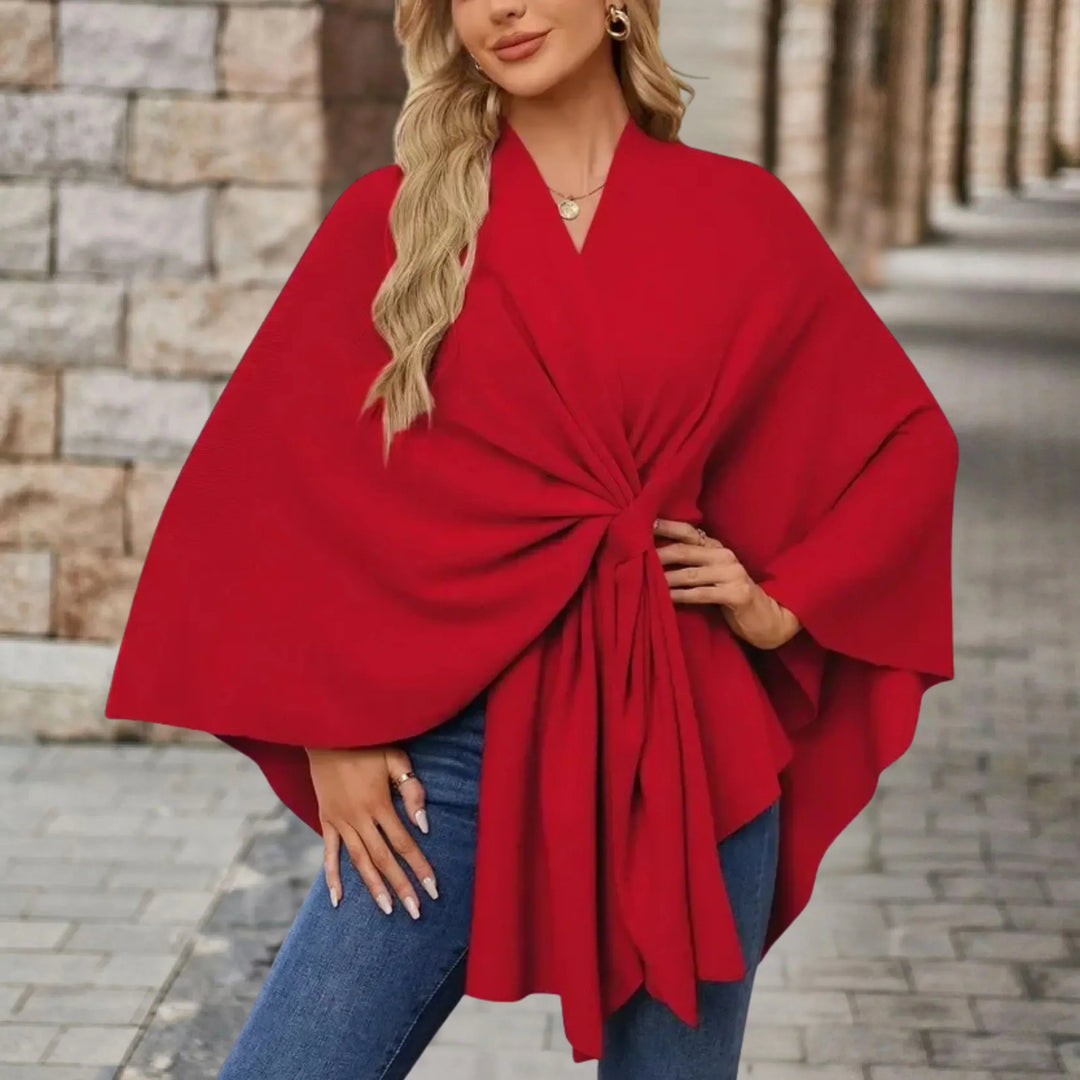 Elegant and comfortable women's draped poncho, a flowing one-size fashion wrap for stylish outerwear.