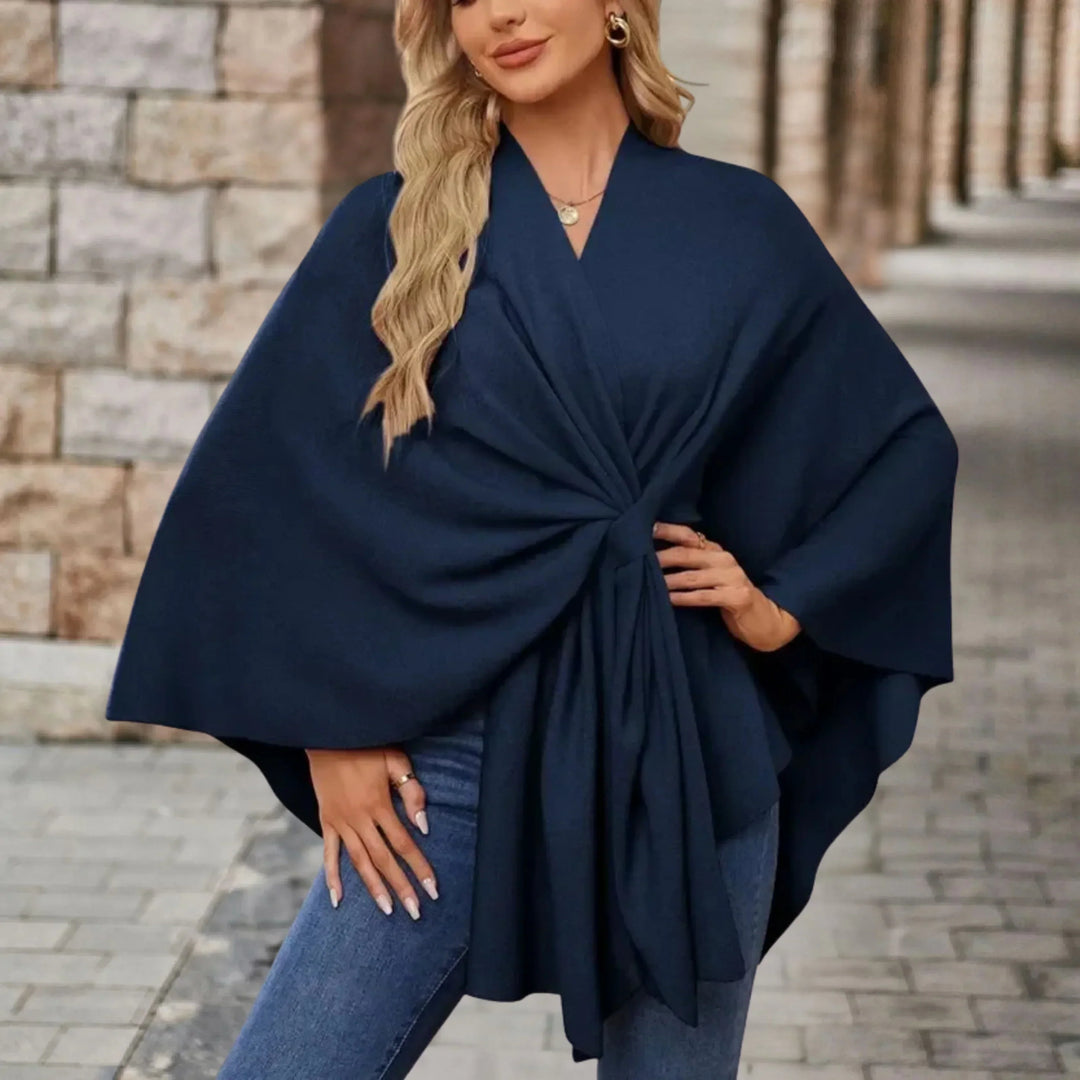 Flowing draped women's poncho, a versatile and stylish fashion wrap perfect as comfortable outerwear.