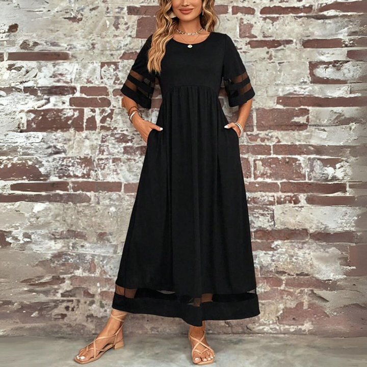 Sophisticated women's dress, ideal for special occasions. Features a comfortable, timeless design with tummy coverage.