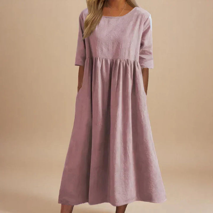 Versatile elegant party dress for women. Flattering midi length, ideal for occasion wear or a classic look.