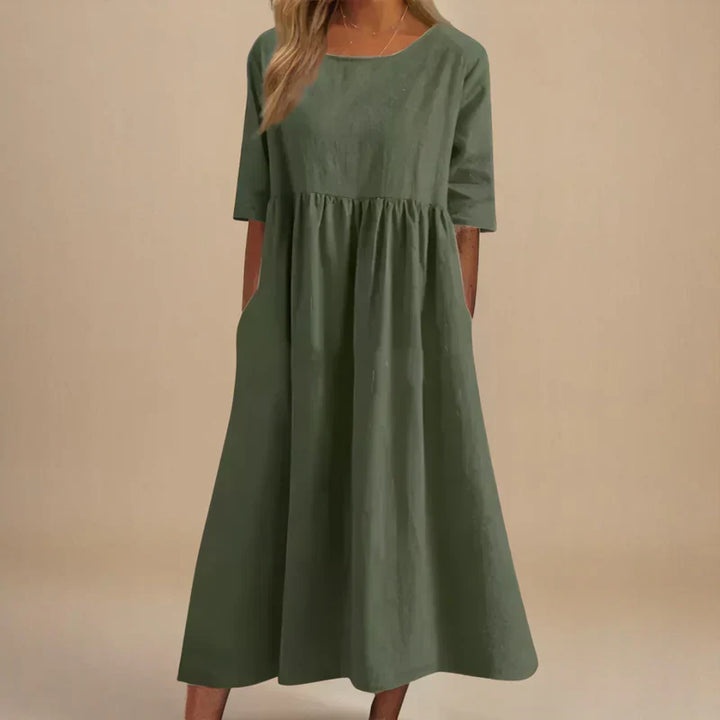 Classic women's midi dress, elegant & flattering. Flowing design makes it comfortable for summer or casual wear.