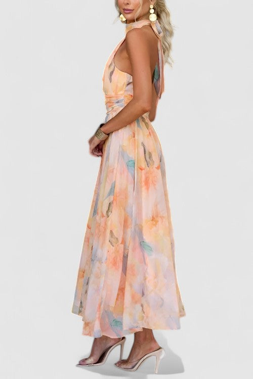 Beautiful women's floral print halter neck maxi dress. Ideal vacation wear, party dress, or elegant summer evening gown.