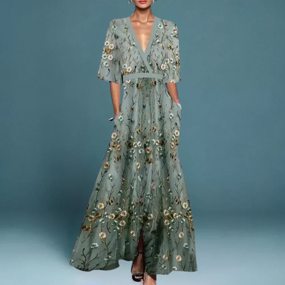 Elegant women's floral maxi dress with a flowing silhouette, perfect for summer and spring fashion.