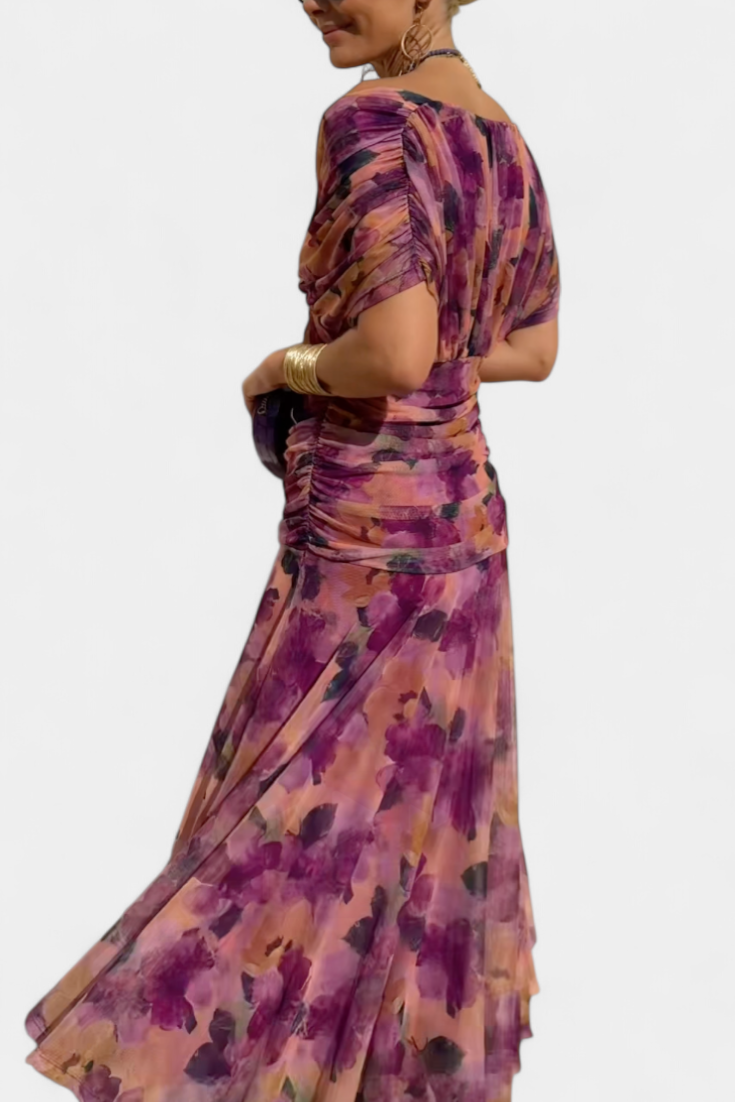 Flowing off-shoulder floral maxi gown for women, sophisticated style, ideal for occasion wear.