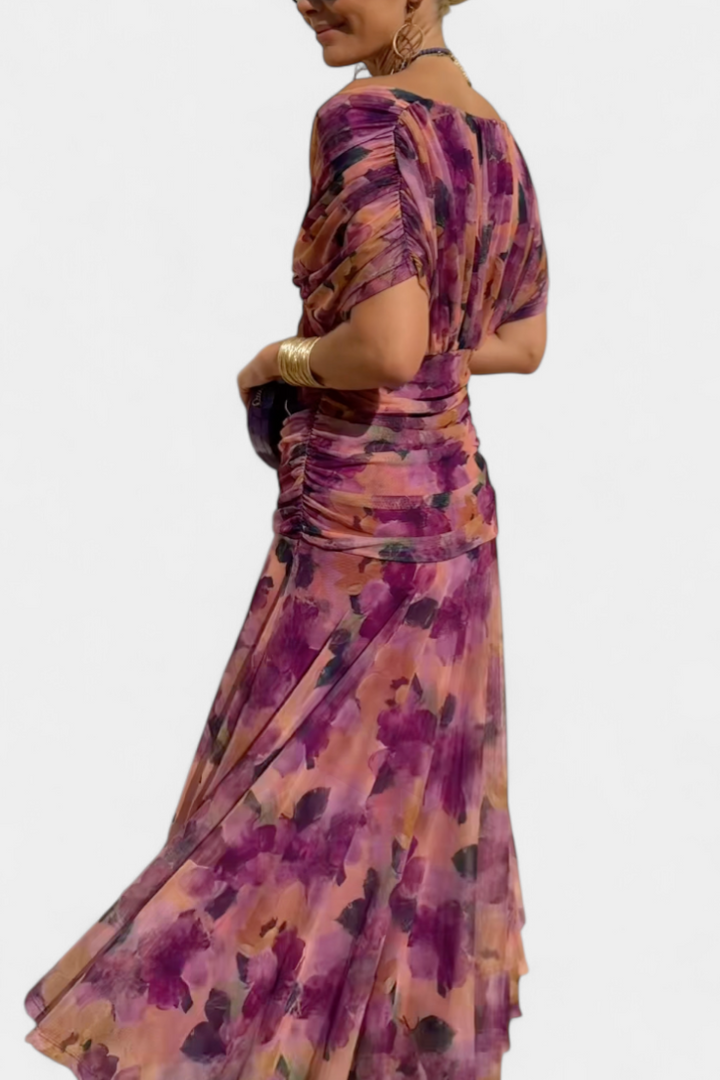 Flowing off-shoulder floral maxi gown for women, sophisticated style, ideal for occasion wear.