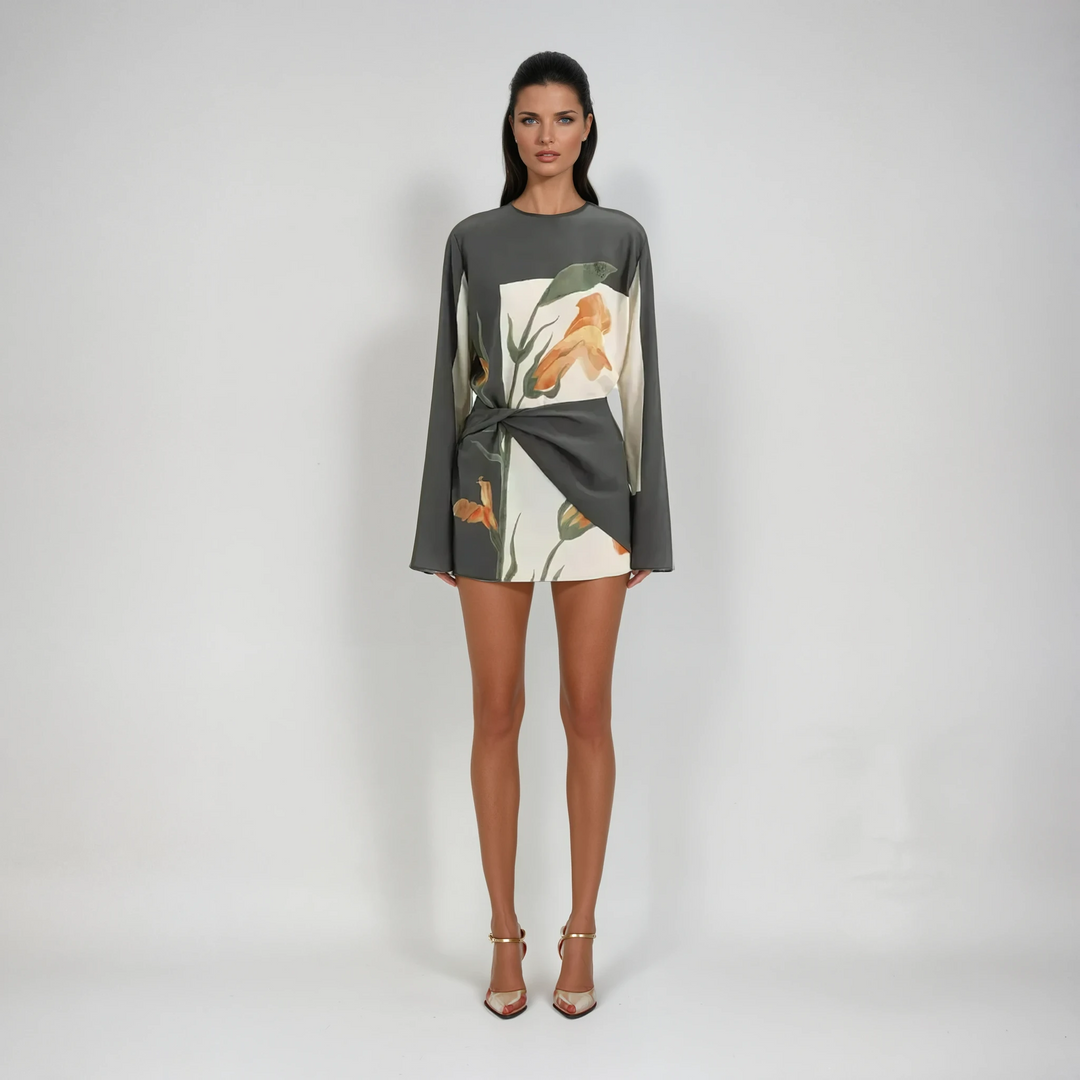 Flattering women's floral mini cocktail dress with a trendy twist front and elegant flared sleeves.