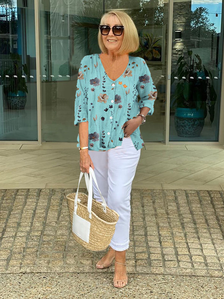 Elegant women's floral print top for spring & summer. Loose fit, comfortable ladies blouse for casual wear.