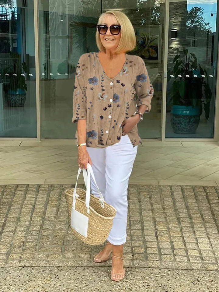 Vibrant floral print women's top. Perfect elegant summer blouse for everyday style & spring fashion.