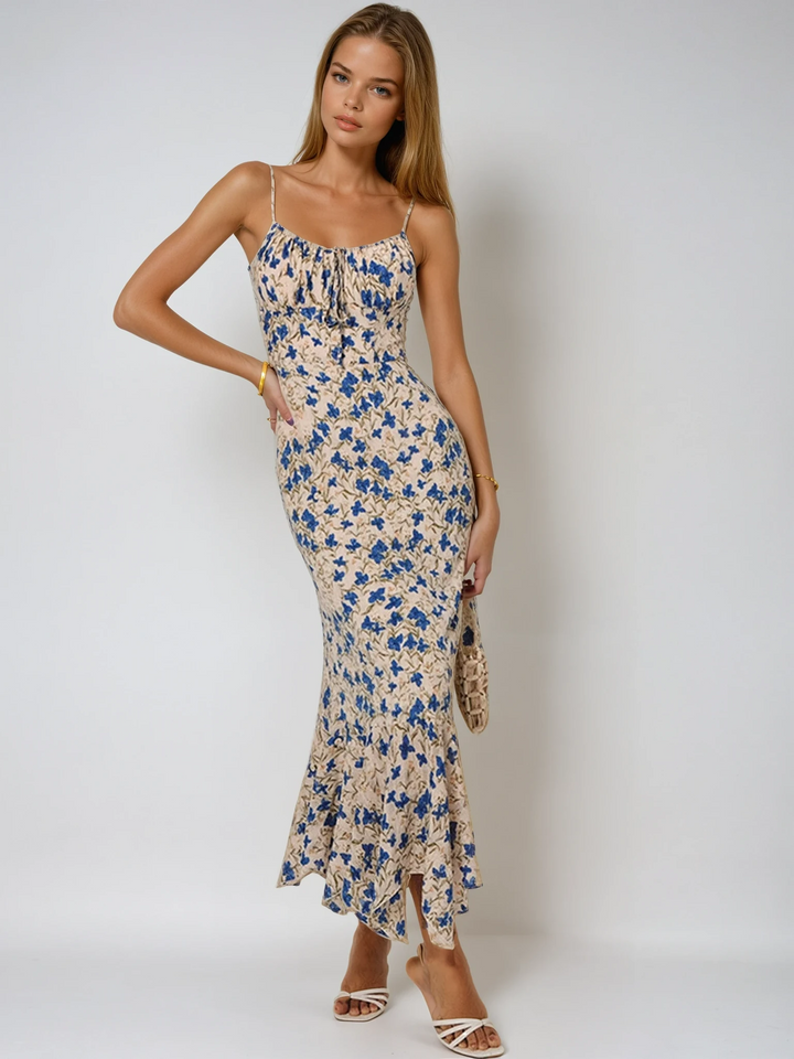 Elegant women's floral ruched maxi dress with spaghetti straps, perfect for summer vacations.