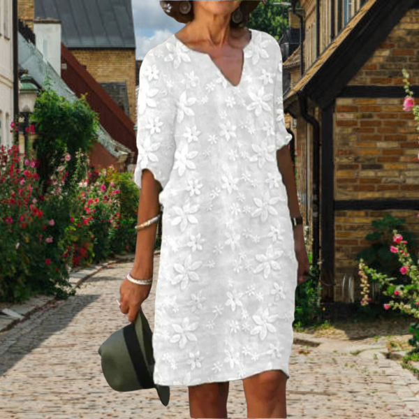 Elegant women's floral v-neck dress with half sleeves, perfect for versatile casual to chic summer wear. Plus sizes available.