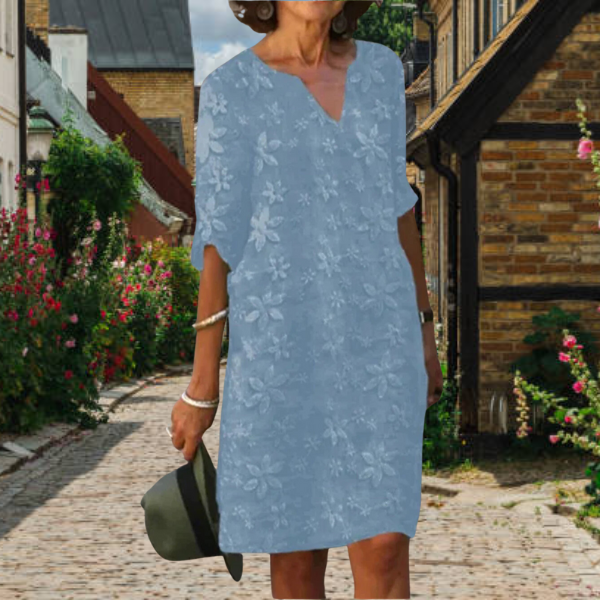 Chic women's floral v-neck summer dress with comfortable half sleeves. Perfect for casual elegance in all sizes.