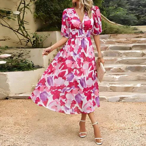 Beautiful women's floral print V-neck midi dress with elegant flow, great for day events & parties.