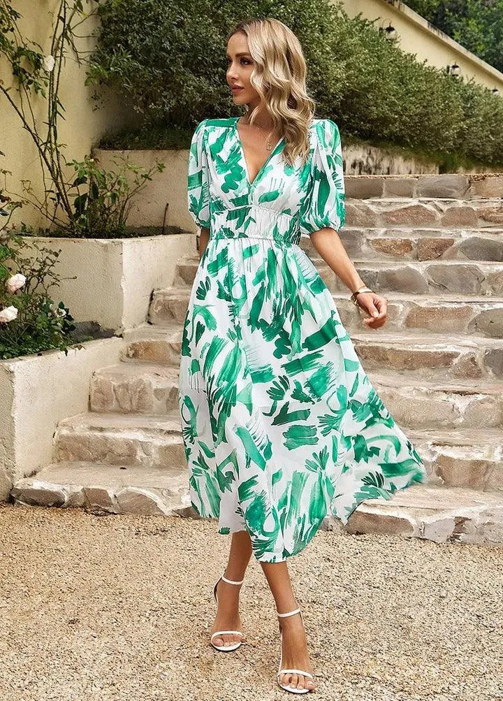 Chic women's V-neck midi dress, featuring a vibrant floral print, comfortable for races & summer parties.