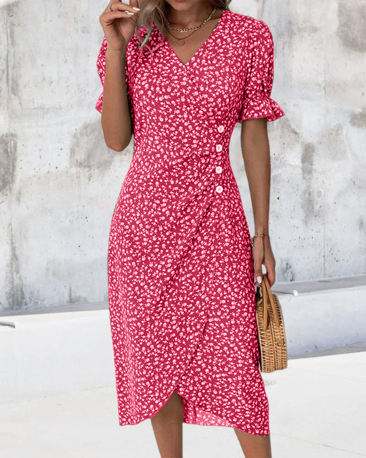 Flowy midi dress for women, showcasing a lovely floral print and a flattering V-neck, great for any occasion.
