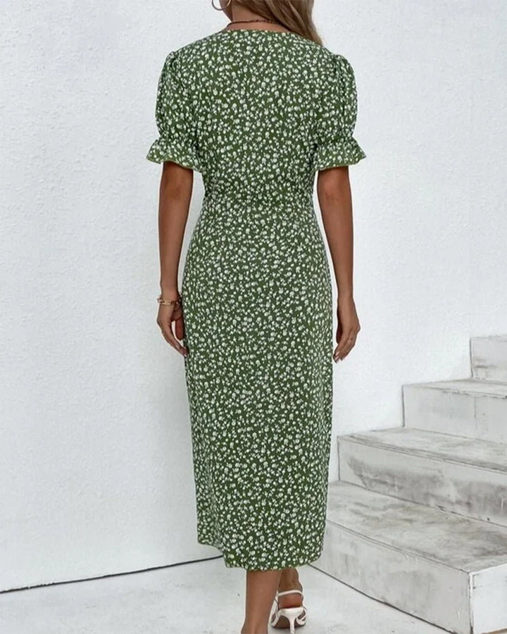 Women's comfortable and flowy floral V-neck midi dress, ideal for relaxed elegance on warm spring and summer days.