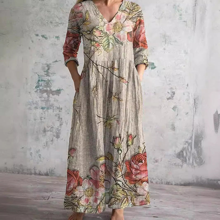 Elegant women's floral V-neck summer dress, perfect for breezy warm weather and vacation.