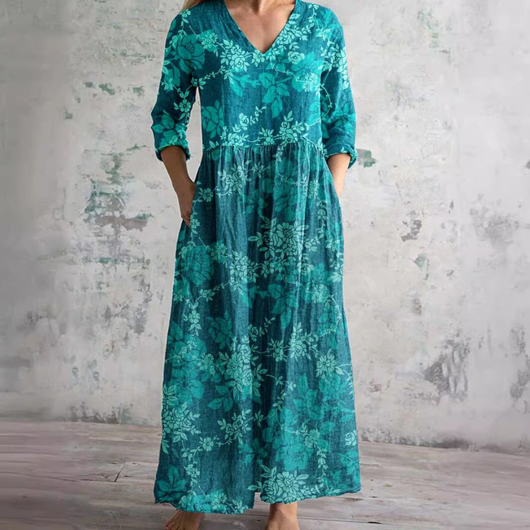 Versatile women's floral V-neck summer dress, offering elegant style and breezy comfort for warm weather.