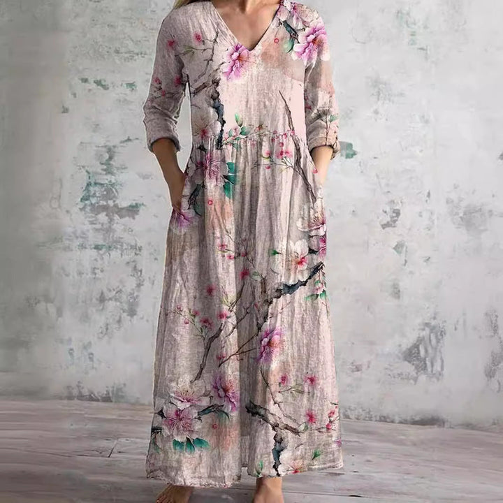 Comfortable & elegant V-neck floral summer dress for women, ideal for casual day wear or vacation.