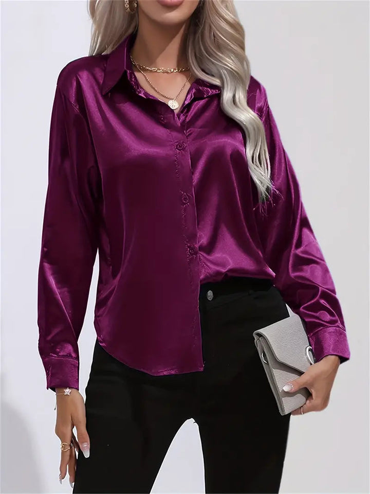 Elegant women's long-sleeve blouse, stylish flowy top. Dressy and versatile for any occasion.