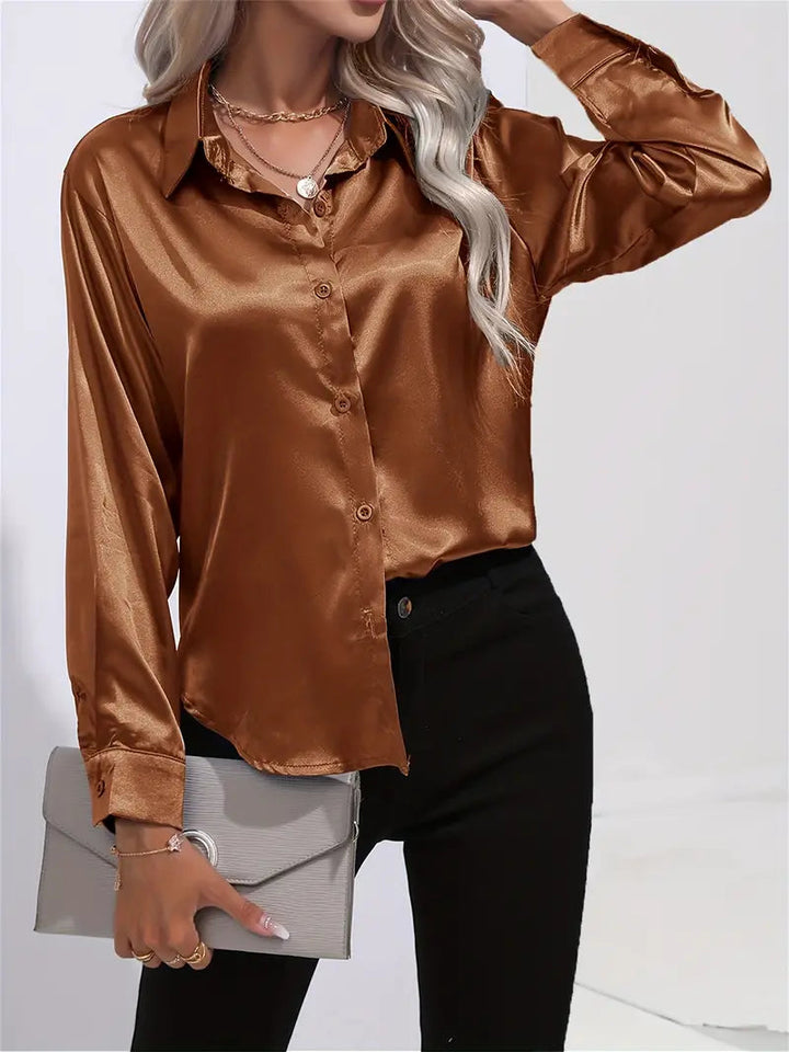 Dressy women's collared workwear shirt, chic and flowy. Ideal for office or evening elegance.