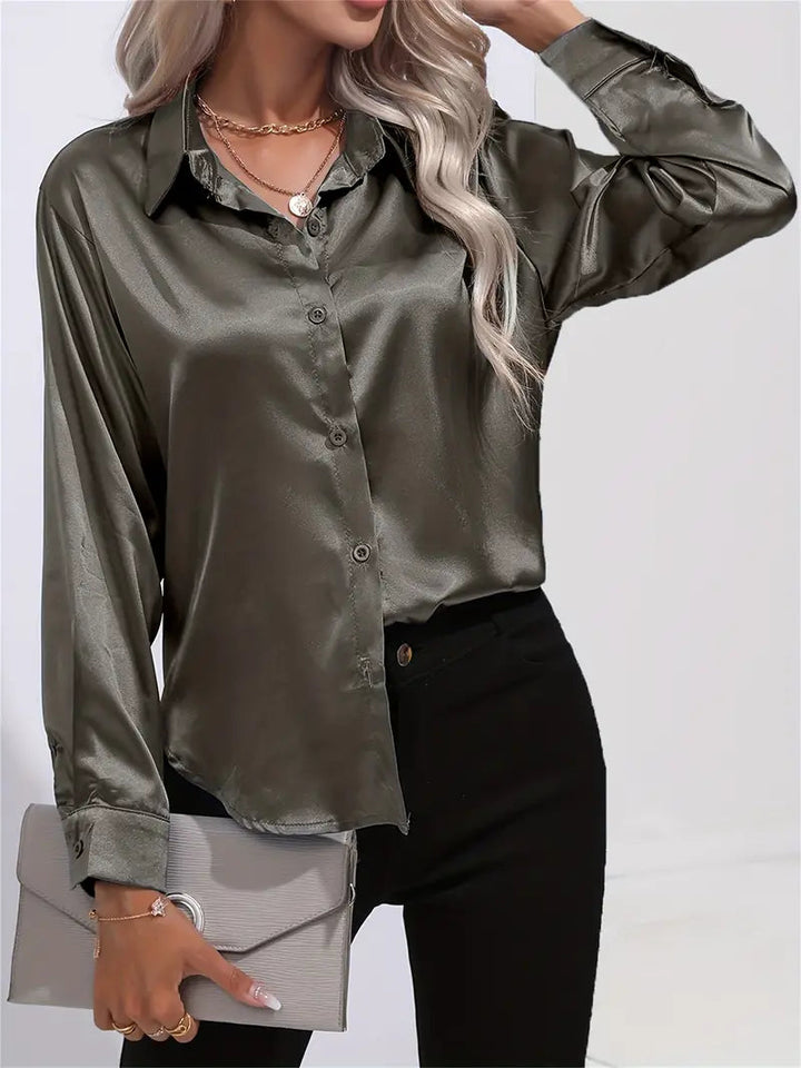 Stylish women's elegant flowy top, comfortable long-sleeve blouse. Perfect for versatile fashion.
