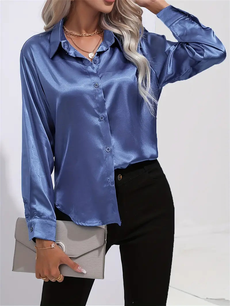 Professional women's button-down shirt, versatile and elegant. Flowy long-sleeve top for office or dressy.