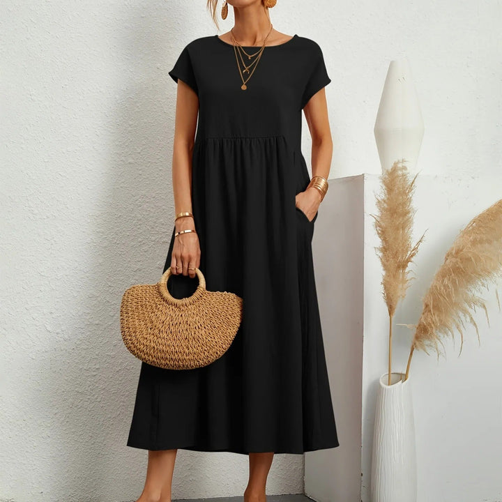 Comfortable women's flowy maxi dress, versatile for day or evening wear, offering effortless style.