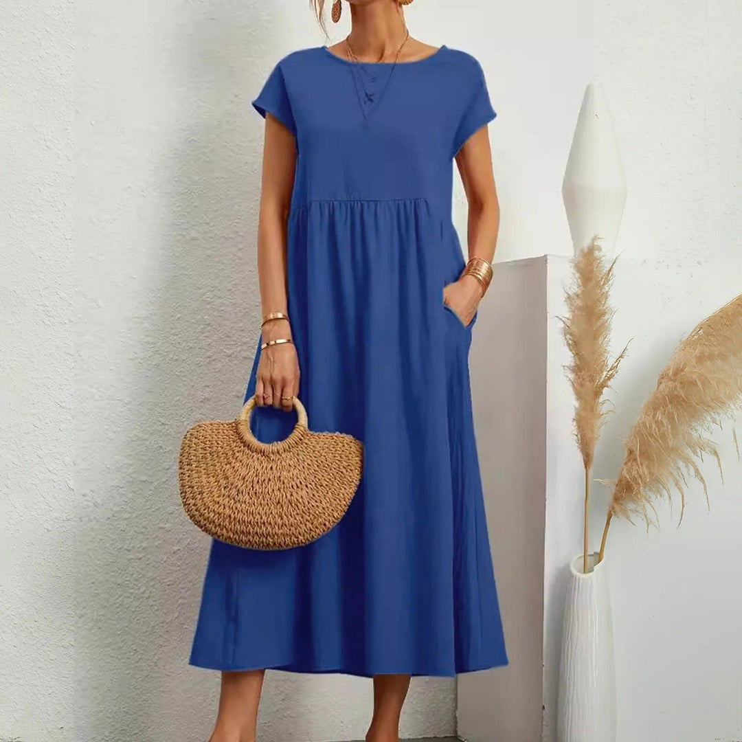 Sophisticated long maxi dress for women, featuring a graceful flowy silhouette & elegant design.