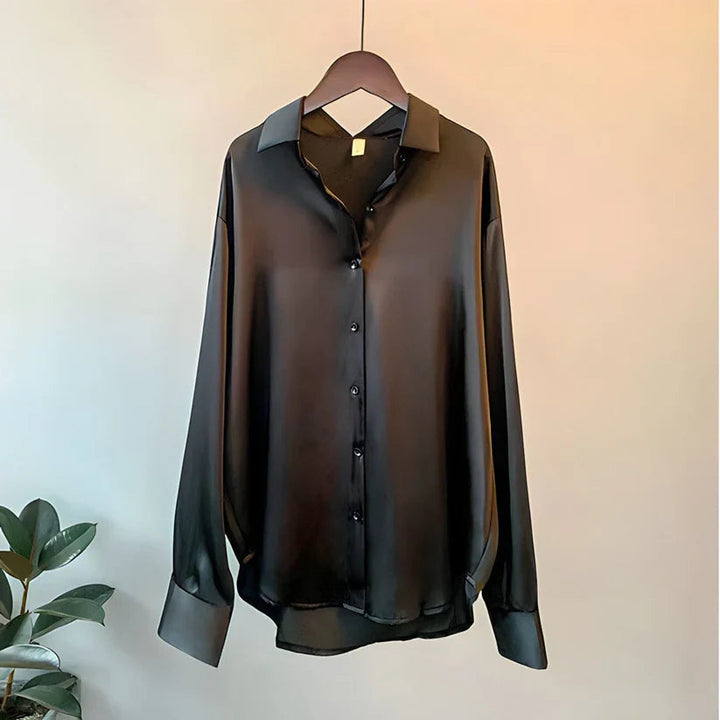 Versatile women's summer blouse, elegant flowy design suitable for casual wear, office, or spring fashion.