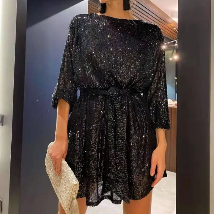 Formal knee-length women's glitter glamour party dress, elegant for special evening events.