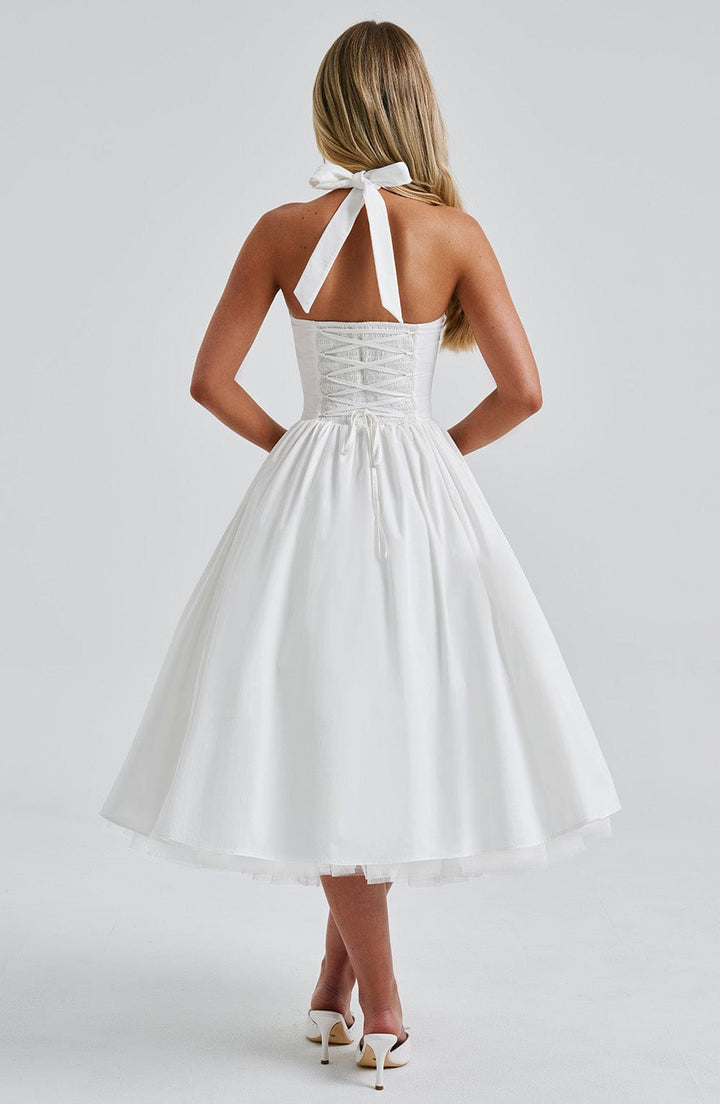 Perfect Wedding Guest Dress: elegant women's halter midi dress with a chic, comfortable design.