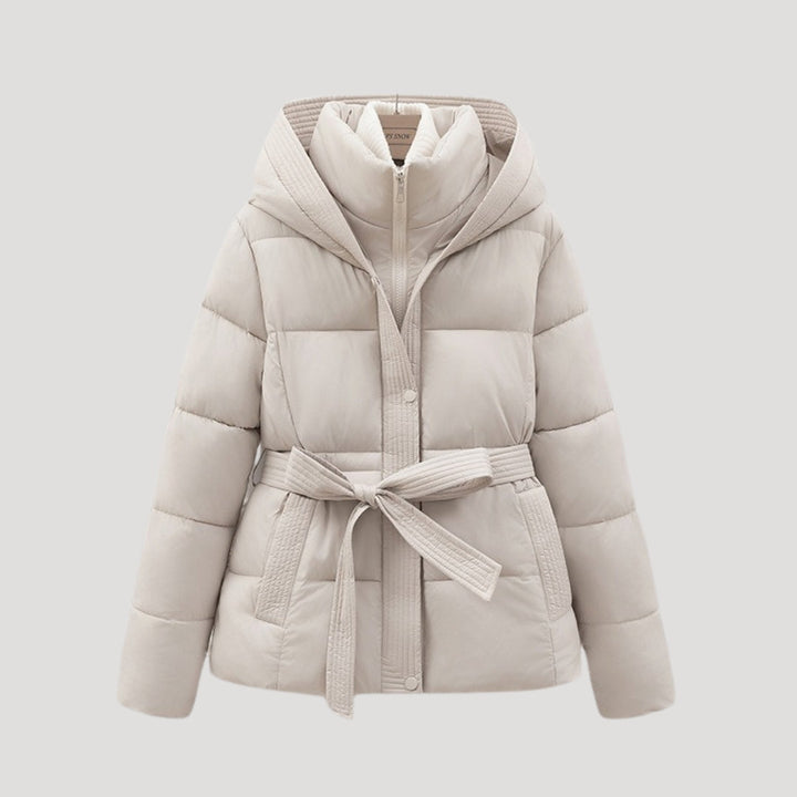 Elegant women's hooded winter puffer jacket with belt, offering warm, stylish protection for cold weather.