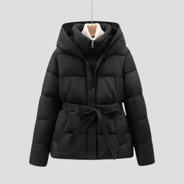 Elegant women's hooded belted puffer jacket, a warm winter coat for stylish cold weather and outdoor wear.