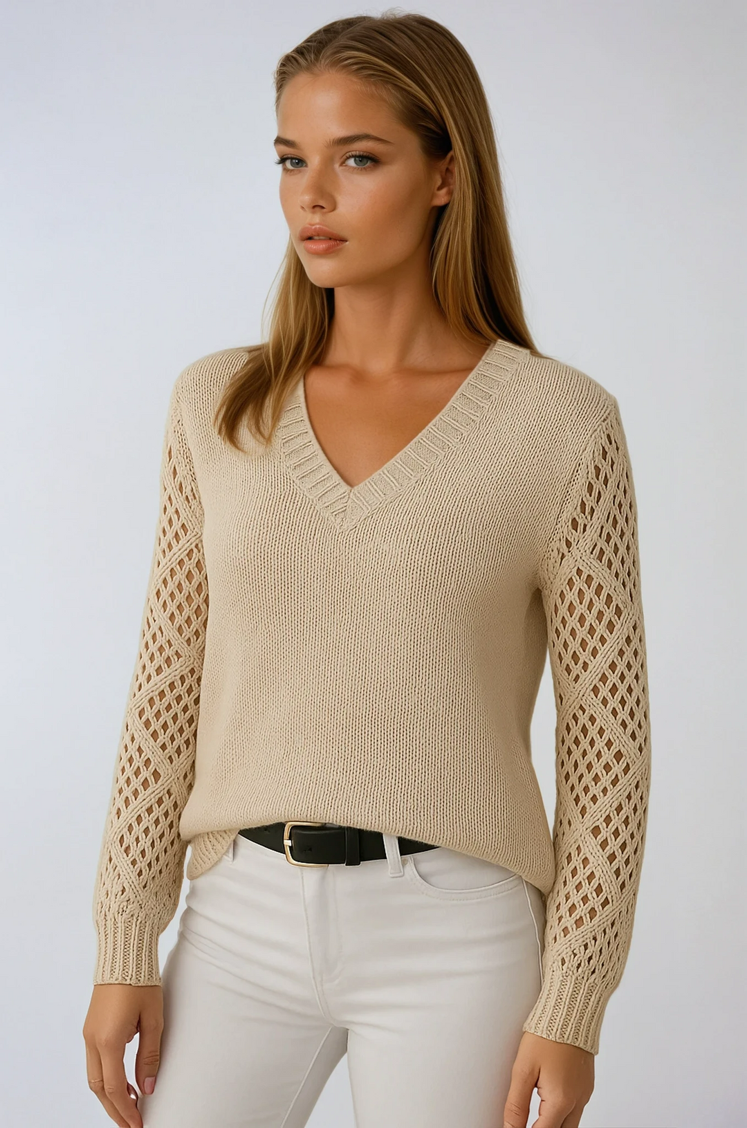 Elegant women's knit sweater with intricate crochet sleeves, perfect for stylish fall and spring layering.