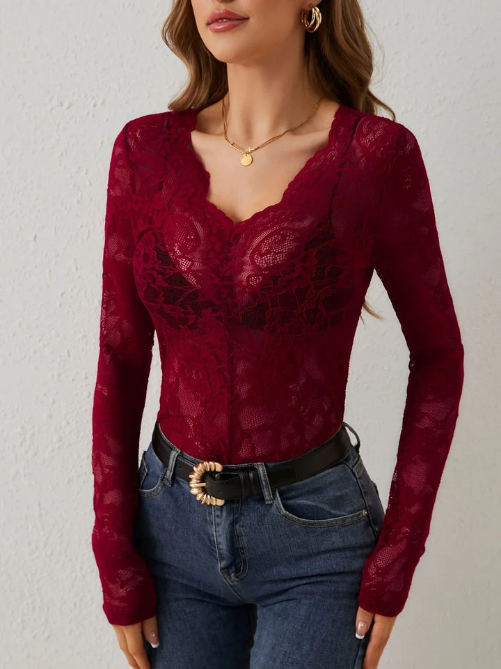 Stylish women's button-front lace blouse, a versatile top for casual or dressy elegant fashion.