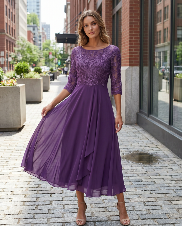 Elegant women's lace bodice midi party dress for special occasions. Perfect for evening or formal events.