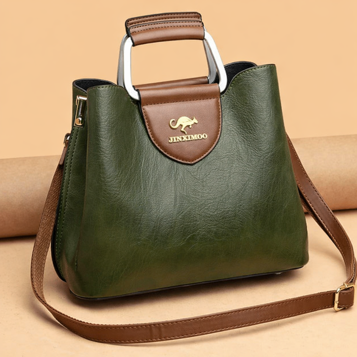 Chic women's fashion leather handbag, an elegant shoulder bag accessory for a refined, luxurious look.