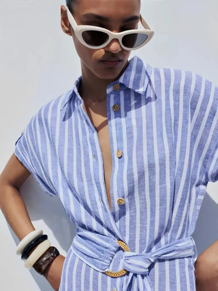 Casual yet elegant women's striped maxi dress with button front and adjustable belt, ideal for daywear.