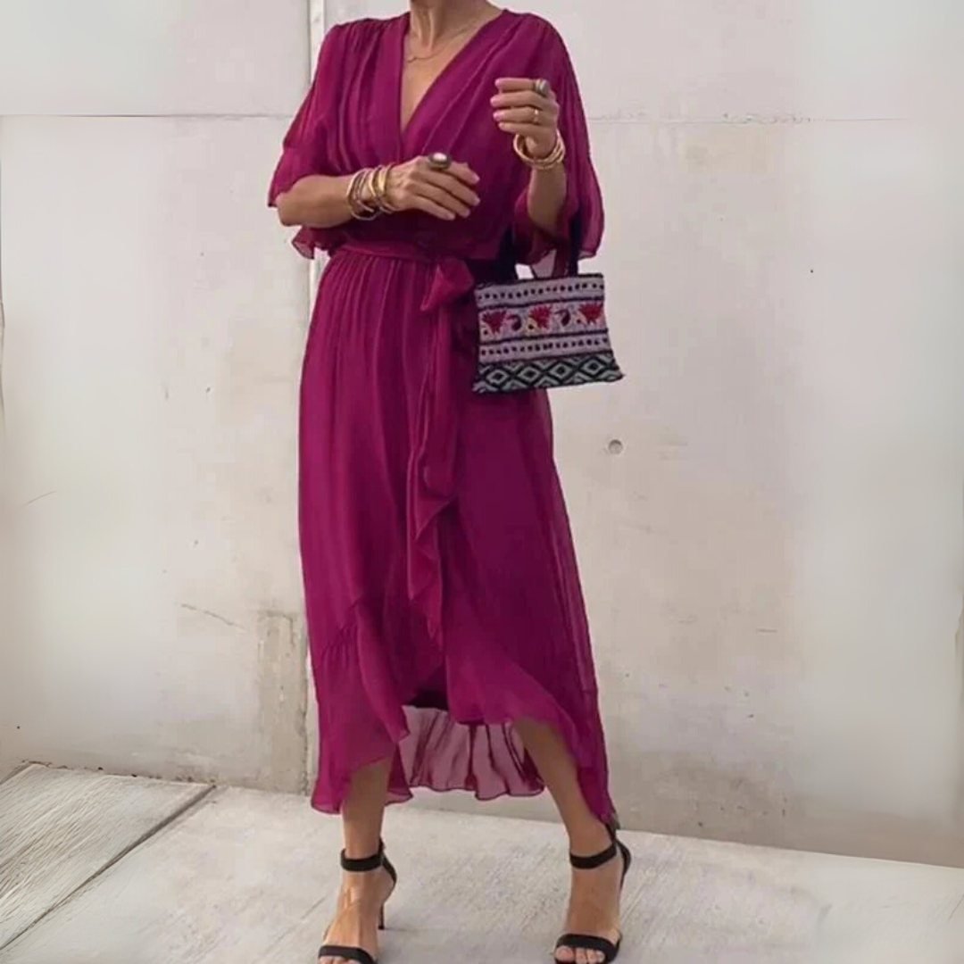 Comfortable women's lightweight wrap dress with adjustable tie. Elegant V-neck, short sleeve, flattering fit.