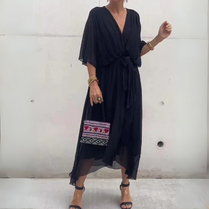 Flattering fit women's wrap dress, lightweight and flowy. Features an adjustable tie for comfort.