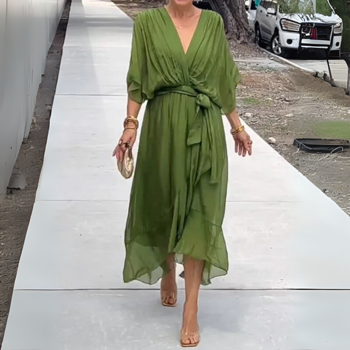 Women's elegant V-neck wrap dress, short-sleeved and lightweight with an adjustable tie waist.