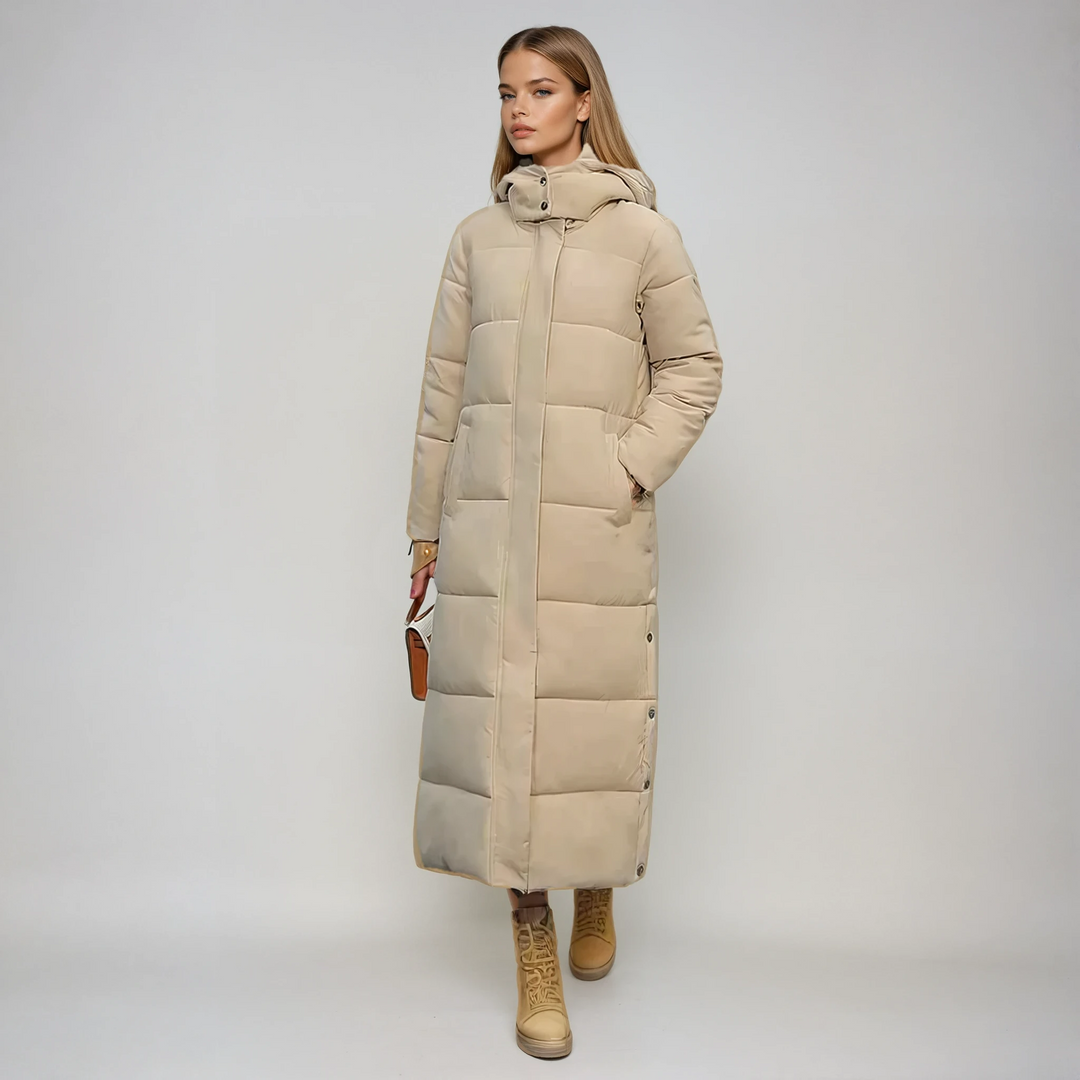 Elegant women's long black puffer coat, warm & stylish for winter outerwear. Quilted design for cold weather.