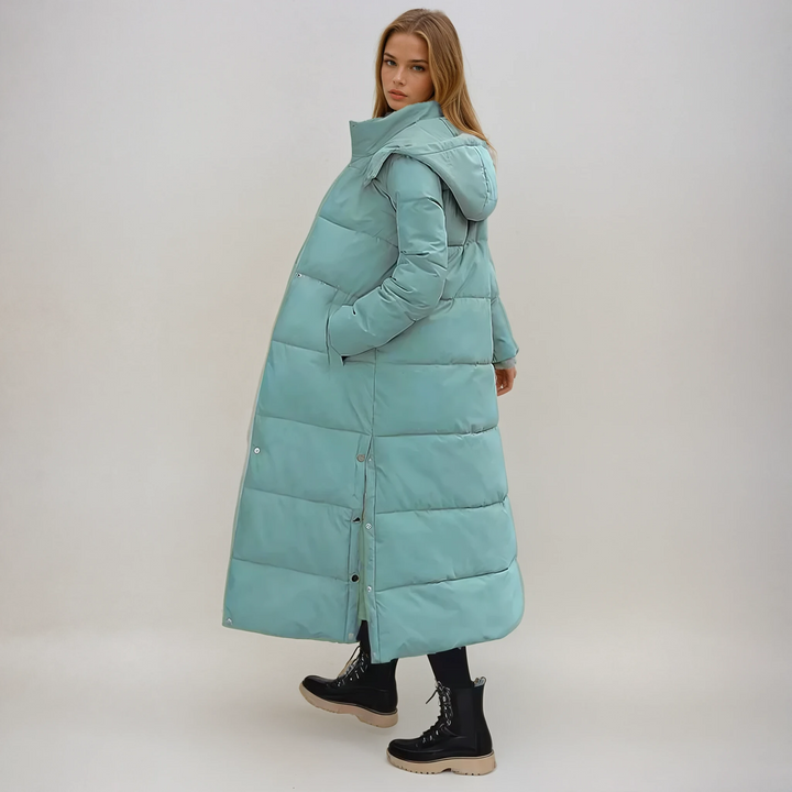 Stay warm & stylish in winter with this elegant women's long puffer coat. Perfect cold weather outerwear.